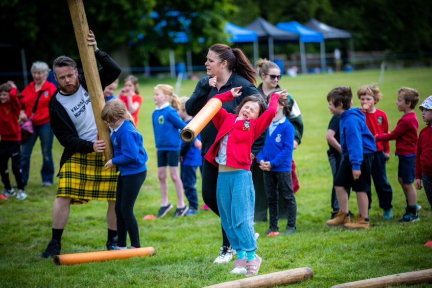 Caber tossing at Glamis junior games.