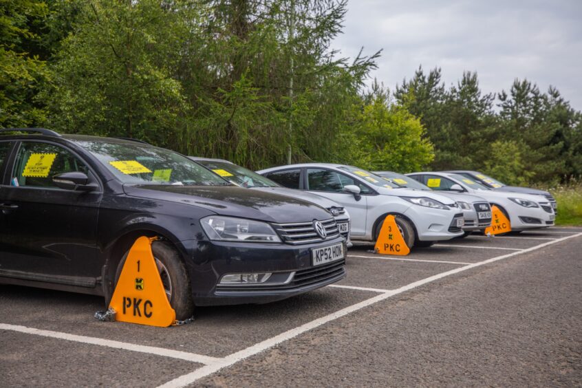 Cars have been clamped for unpaid parking fines.