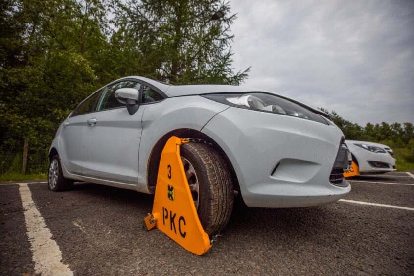 One of the clamped vehicles.