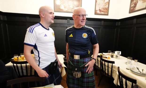 SNP Westminster chief Stephen Flynn with First Minister John Swinney in Munich for the Scotland game. Image: PA.
