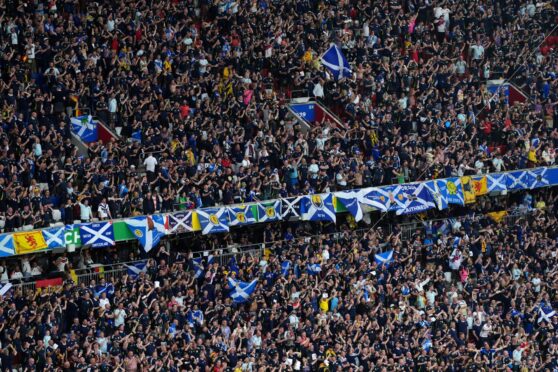 Scotland fans in the stands before the Euro 2024 Germany v Scotland match at Munich Football Arena in Munich, Germany. Image: Bradley Collyer/PA Wire