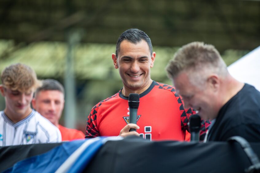 Goalkeeper Deniz Mehmet takes to the mic during the Dunfermline kit launch.