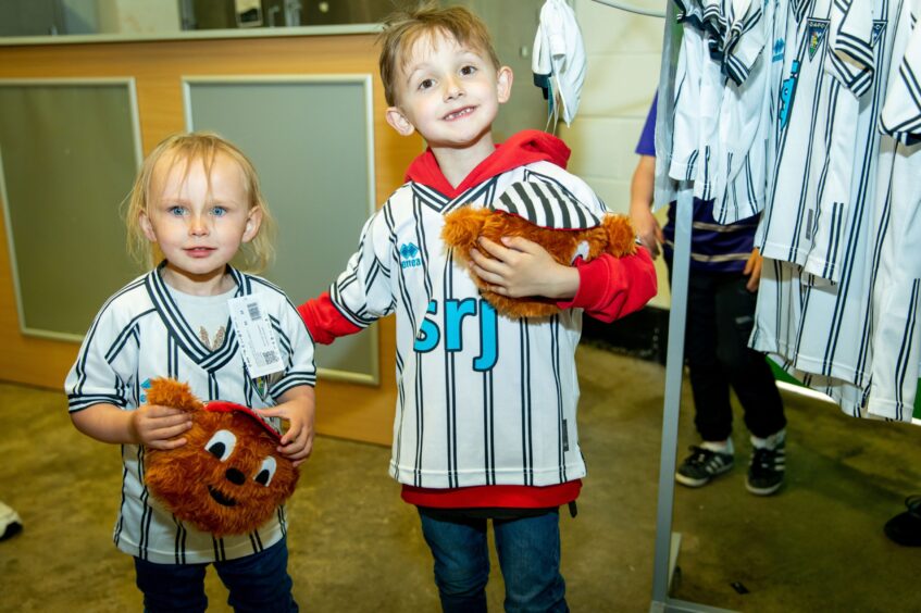 Two young Dunfermline supporters in the new kit.