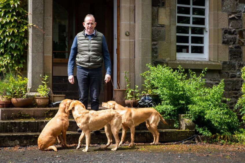 Steven Wade with his dogs at Woodmill Game near Lindores. 