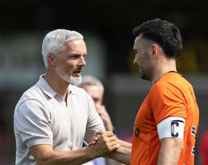 Tony Watt, right, and Dundee United gaffer Jim Goodwin