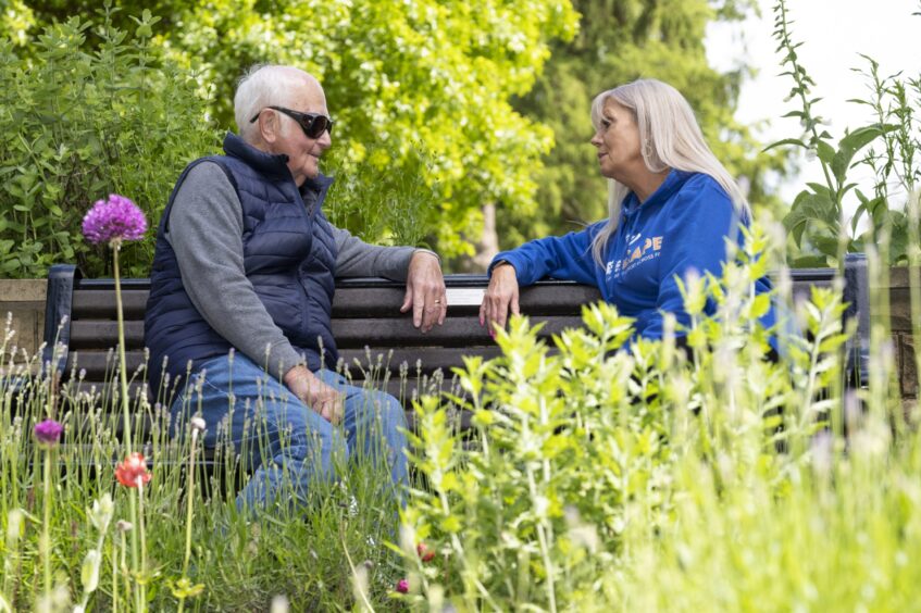 Visually impaired Ian Todd (left) and wellbeing co-ordinator Wendy Leary stop to chat and enjoy nature in Pittencrieff Park.