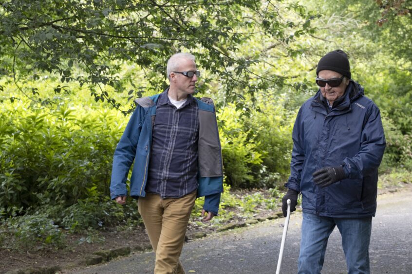 Courier journalist Michael Alexander (left) and visually impaired walker Ian Todd on a Seescape charity nature walk in Fife.