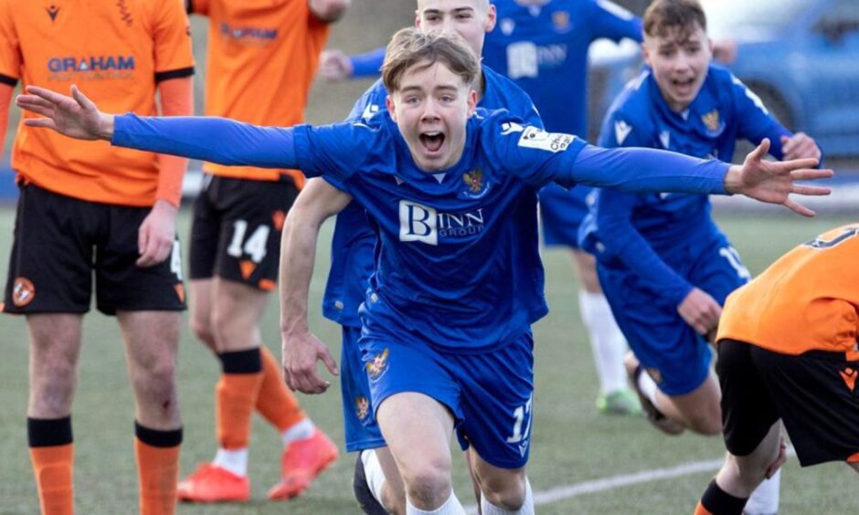 Brodie Dair celebrates scoring for St Johnstone as a 14-year-old. 