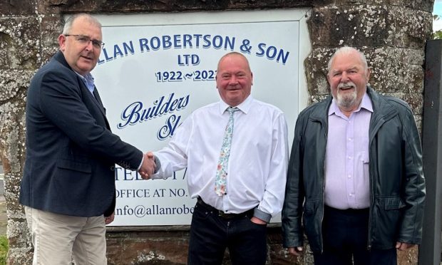 Plasterer Alan Shand (centre) is bowing out after 50 years with family firm Allan Robertson and Son. He is being congratulated by Allan Robertson (left) and his father, also Allan.