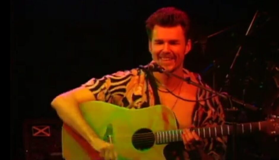 Stuart Adamson on stage with his guitar as Big Country record their live album