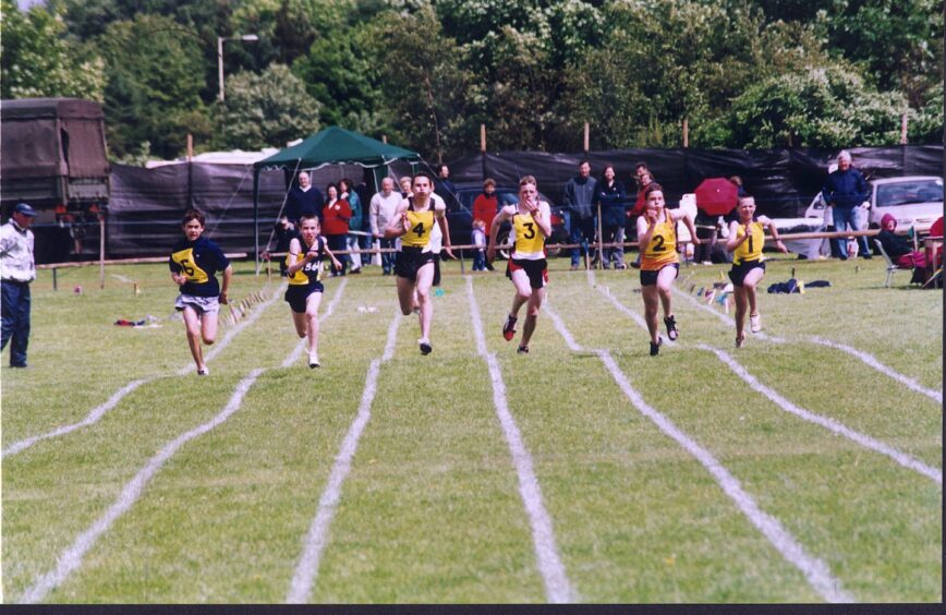 A race at Forfar Highland Games before it moved to Glamis Castle.
