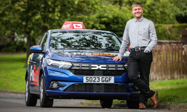 Kieran Law, from Glenrothes, is one of the youngest qualified driving instructors, aged just 22. Image: Mhairi Edwards/DC Thomson