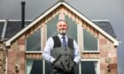 Estate Manager Philip Blount with Kipney Farmhouse behind. Image: Mhairi Edwards/DC Thomson