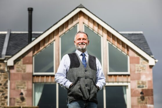 Estate Manager Philip Blount with Kipney Farmhouse behind. Image: Mhairi Edwards/DC Thomson