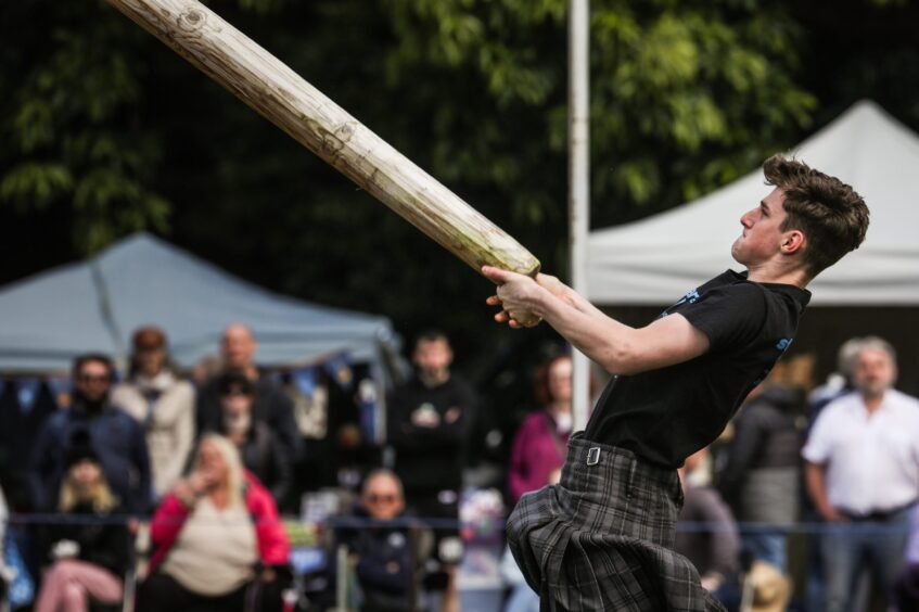 Caber tossing at Strathmore Highland Games.