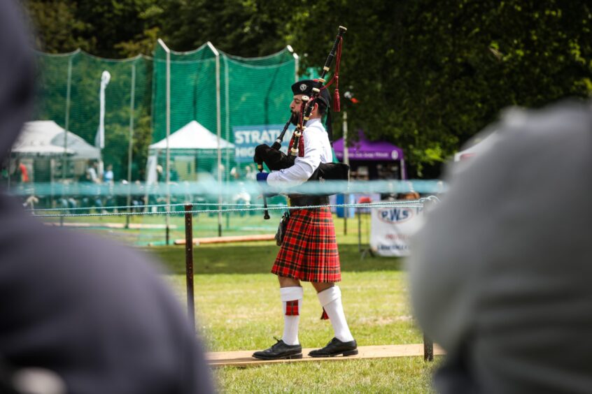 Piper at Strathmore Games in the grounds of Glamis Castle.