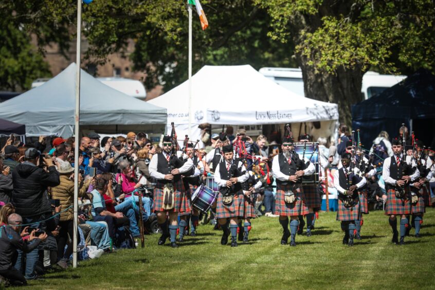 Pipe band marching at Strathmore Games.