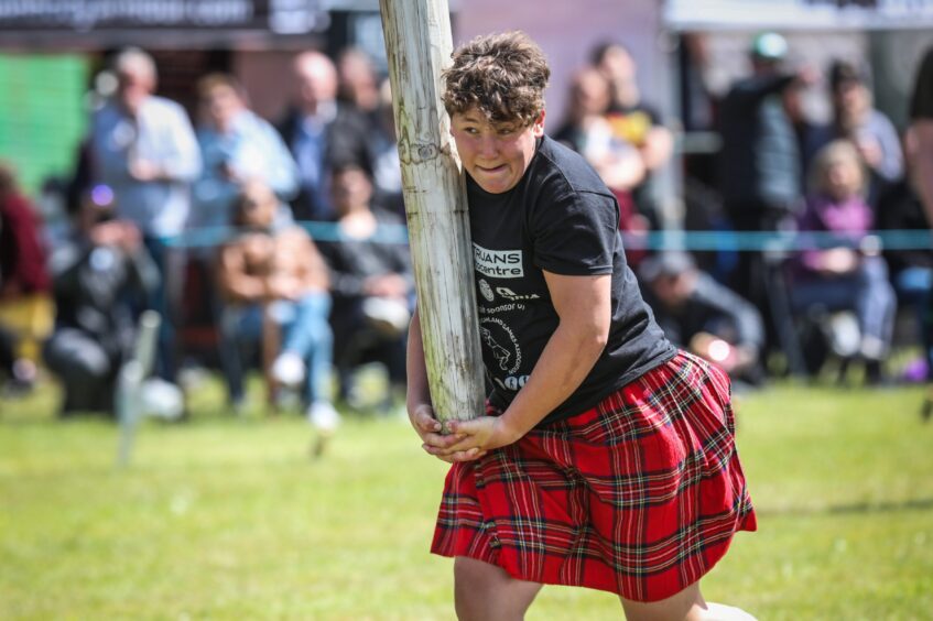 Caber toss at Strathmore Highland Games.