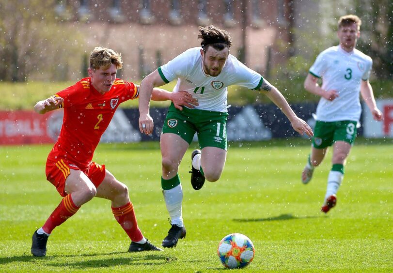 Dundee United's "ill Ferry, No.11, in full flow for Ireland U/21s against Wales