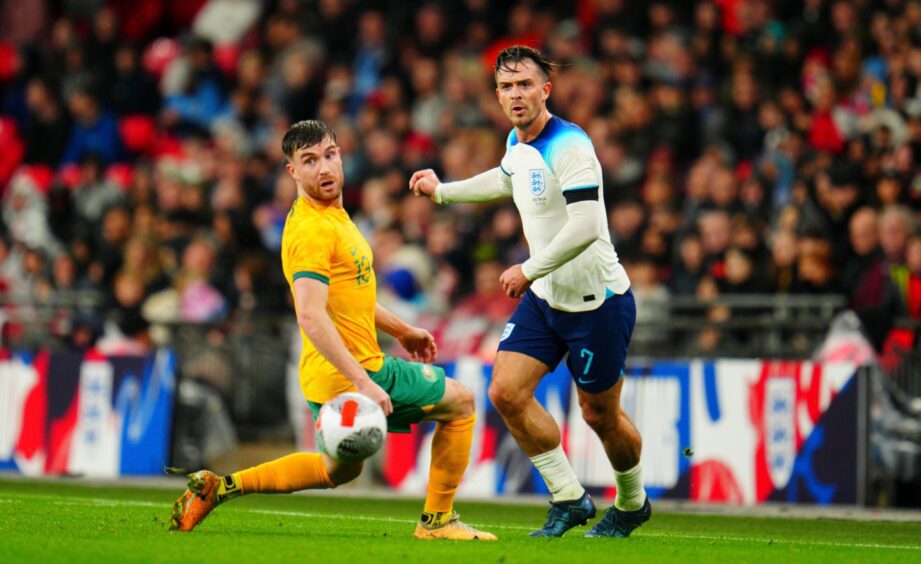 Dundee United's Ryan Strain in Australia action against England