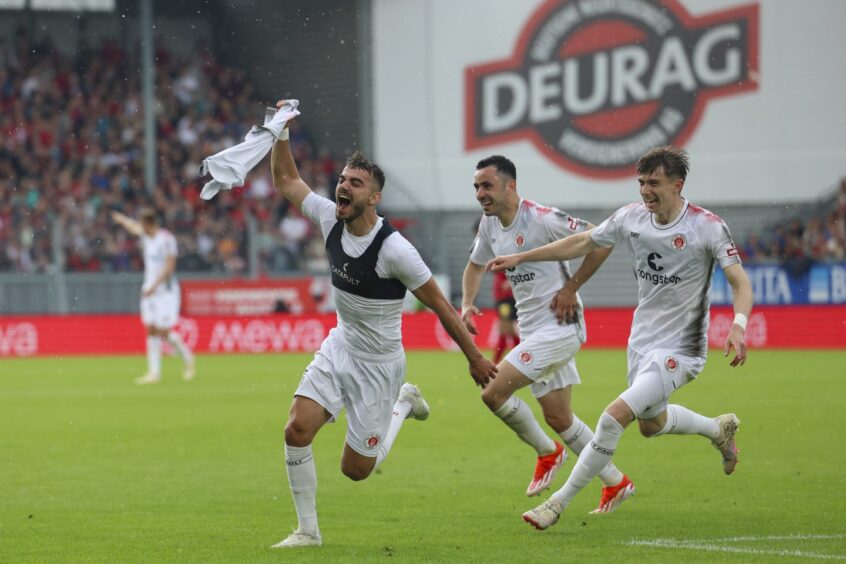 Scott Banks, right, celebrates a St Pauli goal