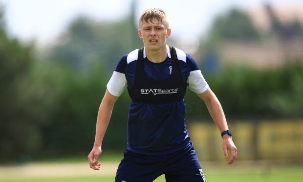 Luke Graham standing at training for Dundee FC.