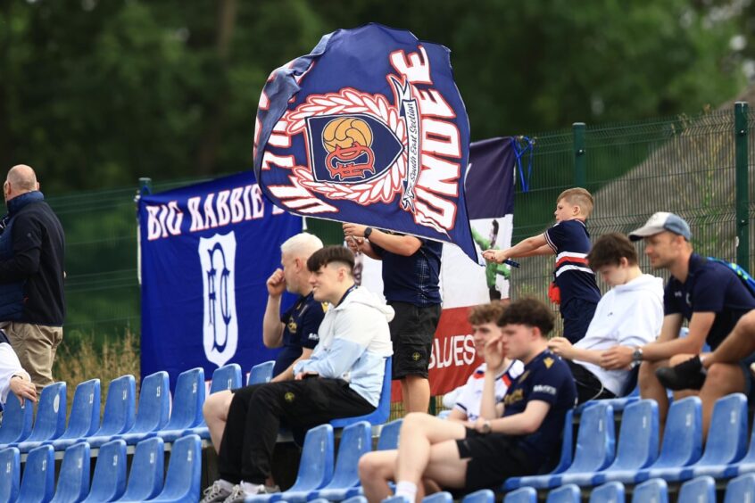 Dundee fans watch on in Poland. Image: David Young