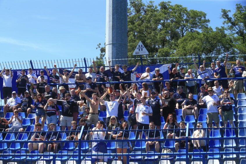 Dundee fans in the Polish sun at Lech Poznan's Stadion Akademii. Image: David Young