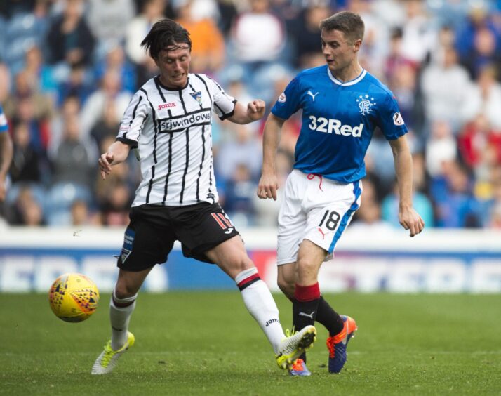 Joe Cardle battles for the ball during Dunfermline's defeat to Rangers in 2017.