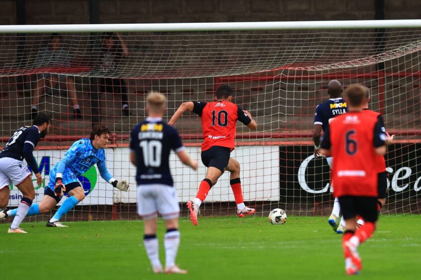 Tommy Goss brings Annan level just before the break. Image: David Young/Shutterstock