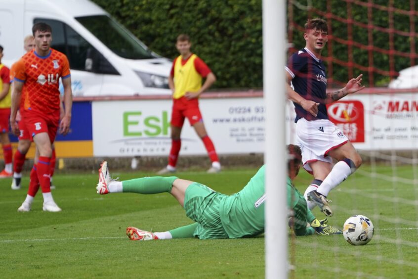 Seb Palmer-Houlden finds the net from a tight angle as he scored the first of his two goals. Image: David Young/Shutterstock