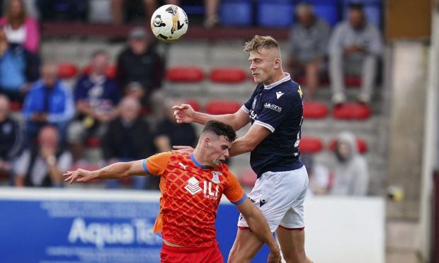 Luke Graham wins an aerial battle against Inverness on his full debut.