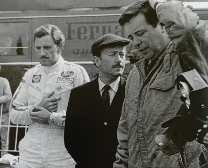 Colin Chapman, centre, with double F1 world champion, Graham Hill, left.