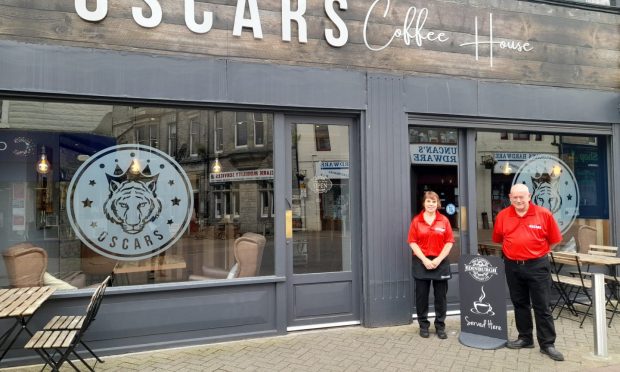 Phill and Tracey outside Oscars Coffee House in Leven. Image: Phill Corletto