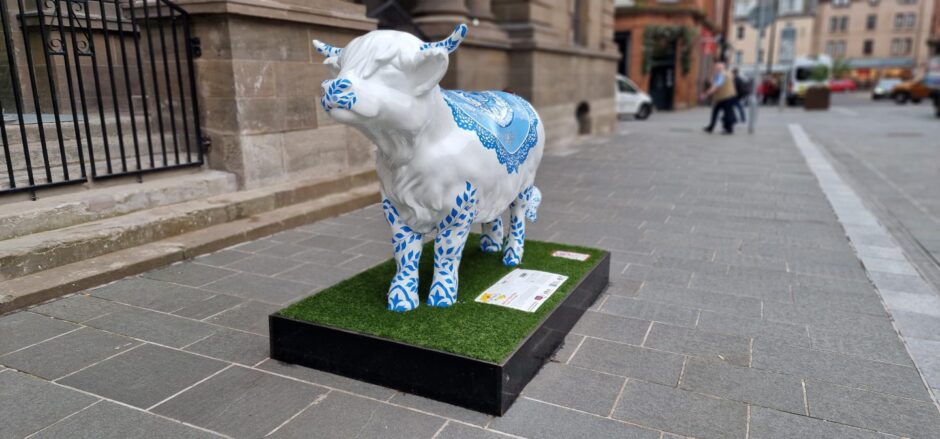 blue and white cow sculpture outside Perth Museum