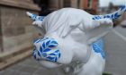 Close up of blue and white cow sculpture outside Perth Museum