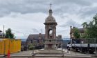Murray fountain, Crieff, with the last of the metal fencing being removed