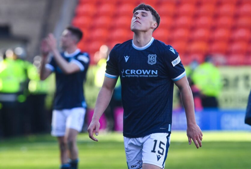 Josh Mulligan takes in the Dundee derby after a 2-2 draw at Tannadice. Image: SNS