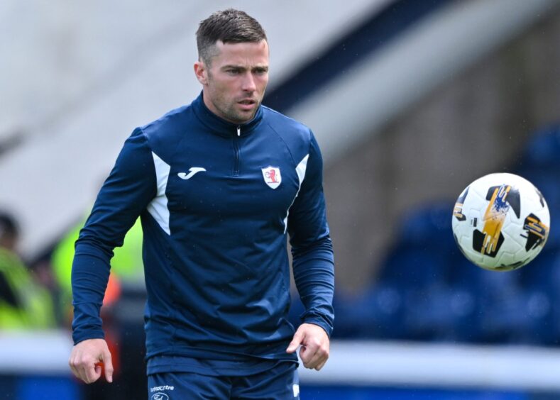 Lewis Stevenson warms up for Raith Rovers.