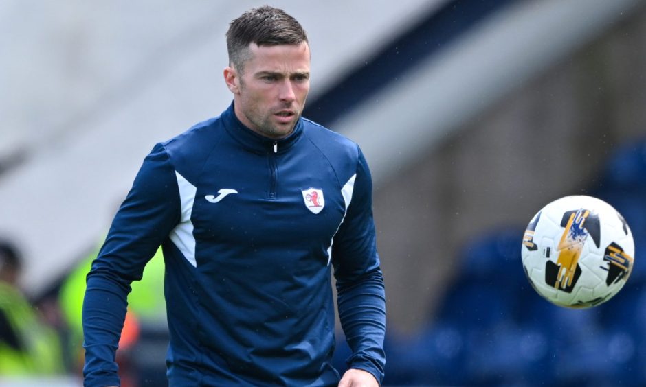 Lewis Stevenson warms up for Raith Rovers.