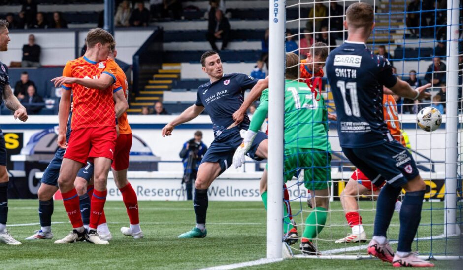 Paul Hanlon knocks in Raith Rovers' winning goal from close range.