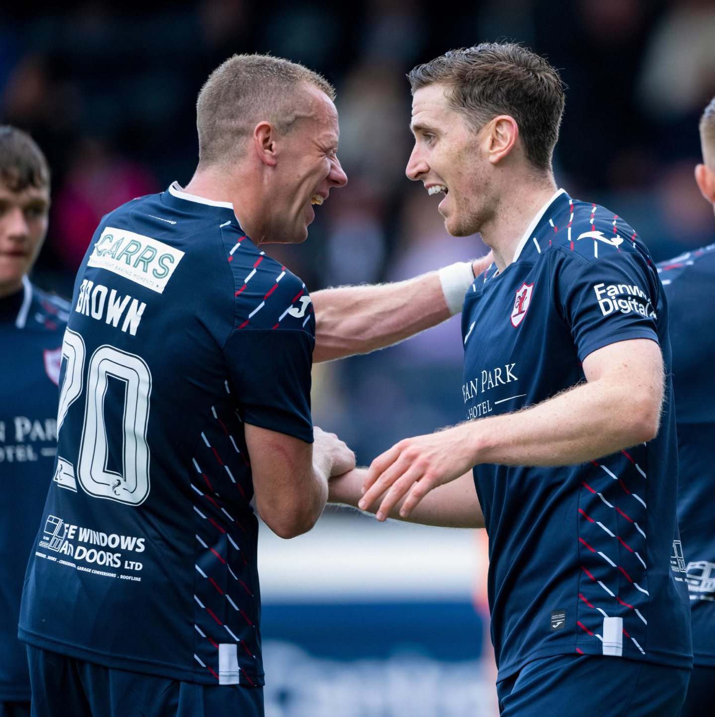 Paul Hanlon celebrates with Scott Brown after scoring during a pre-season clash with Inverness Caley Thistle.