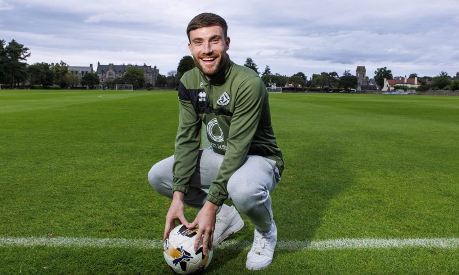 Ryan Strain is all smiles ahead of his Dundee United bow.