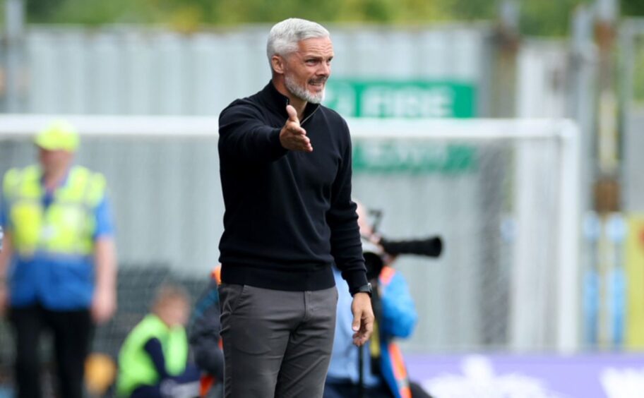 A frustrated Jim Goodwin makes his feeling known during Dundee United's defeat at Falkirk