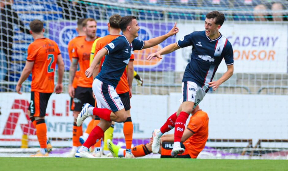 Falkirk's Dylan Tait wheels away after making it 1-0 against Dundee United