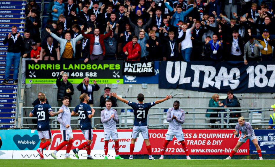 Falkirk's Dylan Tait soaks up the celebrations following his clinical opener against Dundee United