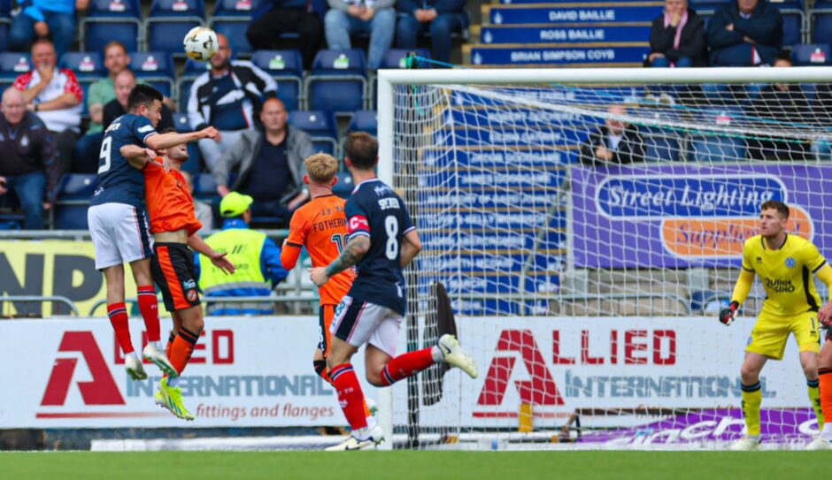 Ross MacIver leaps high to make it 2-0