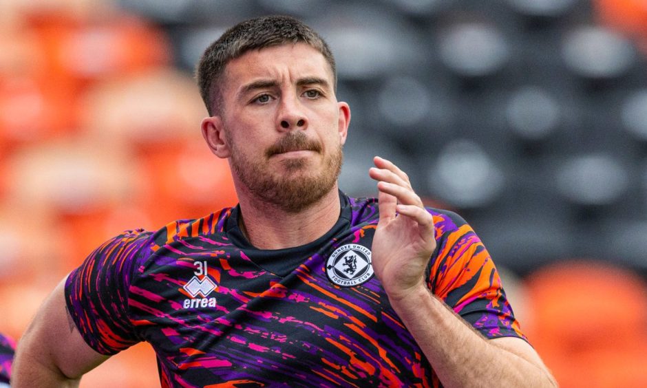 Dundee United's Declan Gallagher running in training.