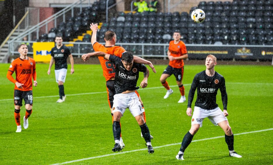 Louis Moult heads home his first goal of the campaign for Dundee United