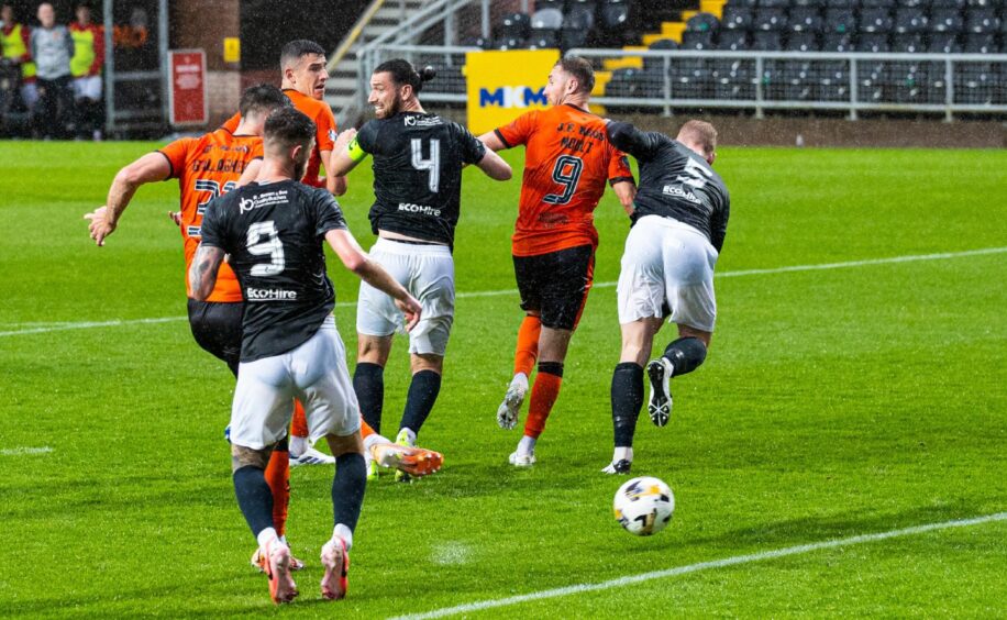 Dundee United's Declan Gallagher converts his first United goal